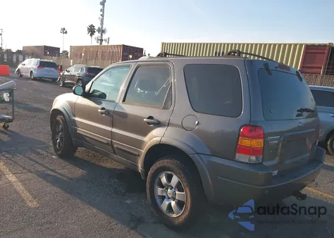 2004 Ford Escape Limited z USA, uszkodzony, nr VIN 1FMCU94184KA49168
